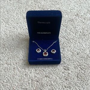 Red and Silver Necklace with Circular Pendant